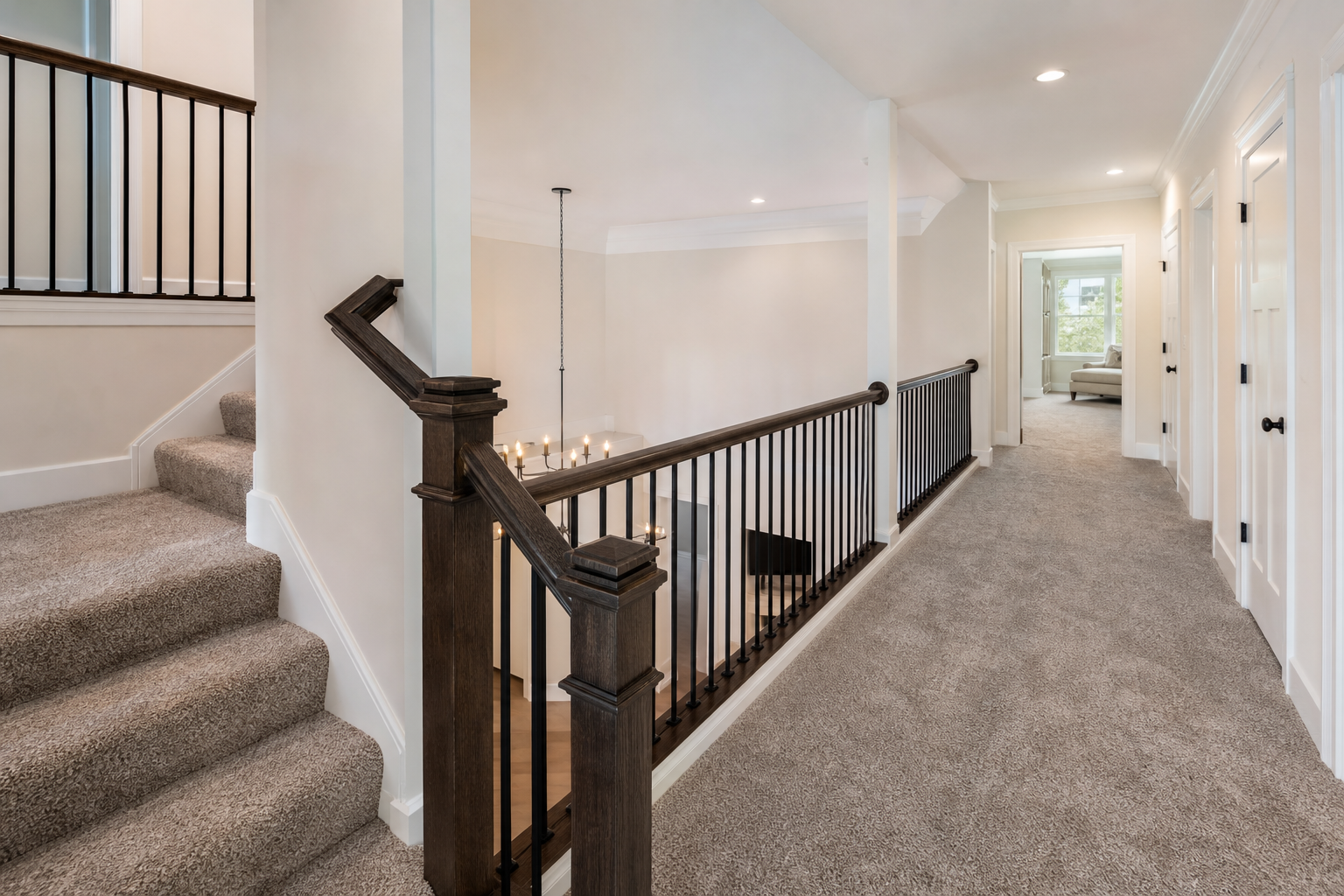 Finished carpeted staircase and upstairs hall