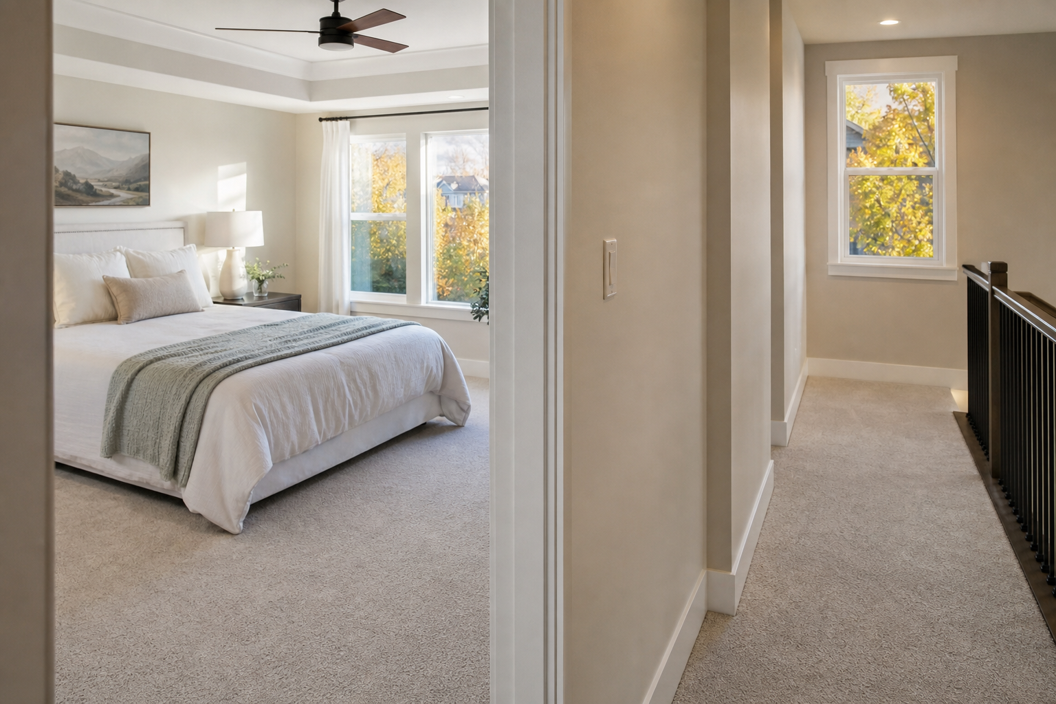 Finished Bluffdale-area bedroom and upper hallway with soft neutral carpet and warm early fall light.